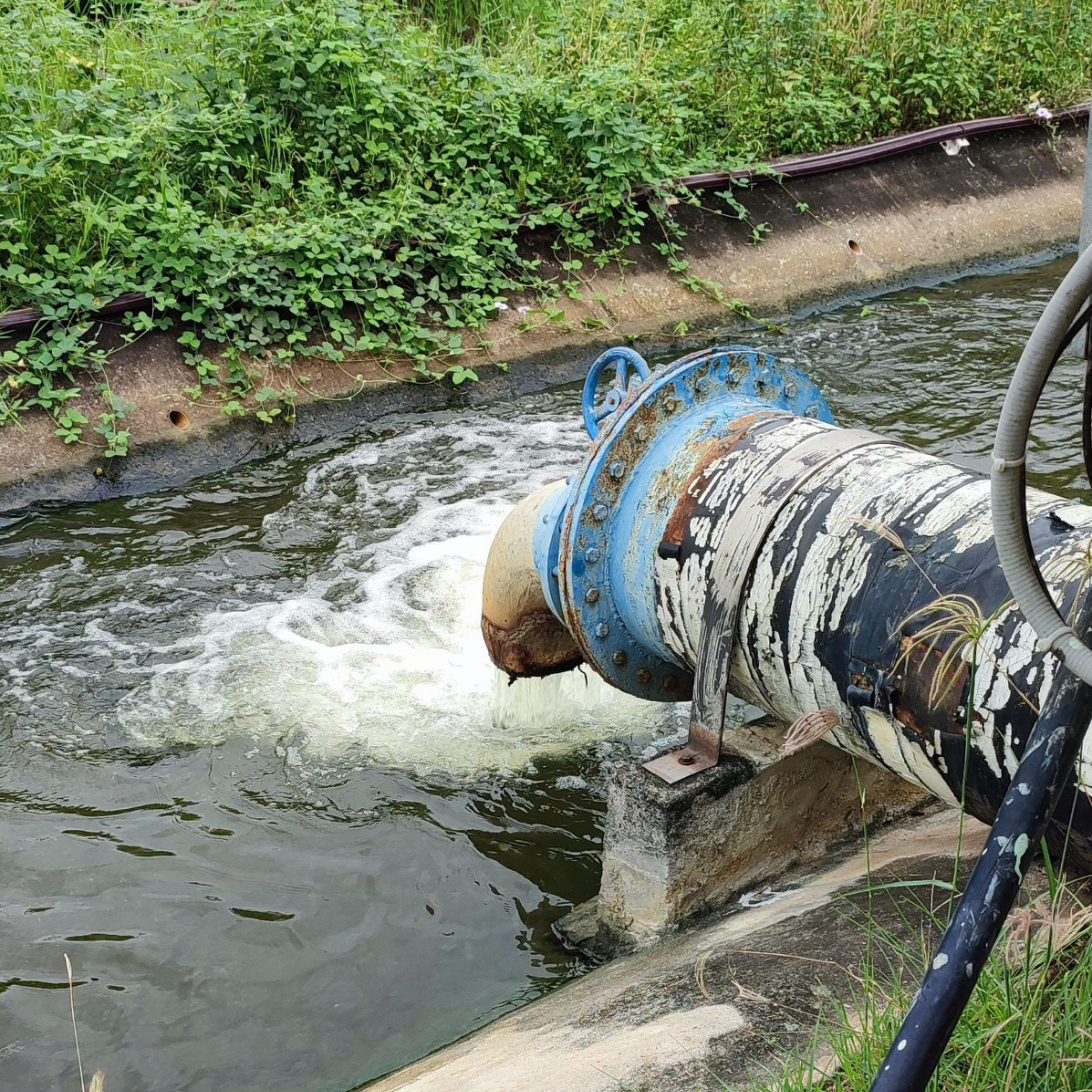 Discharge pipe with flow flowing into local water source